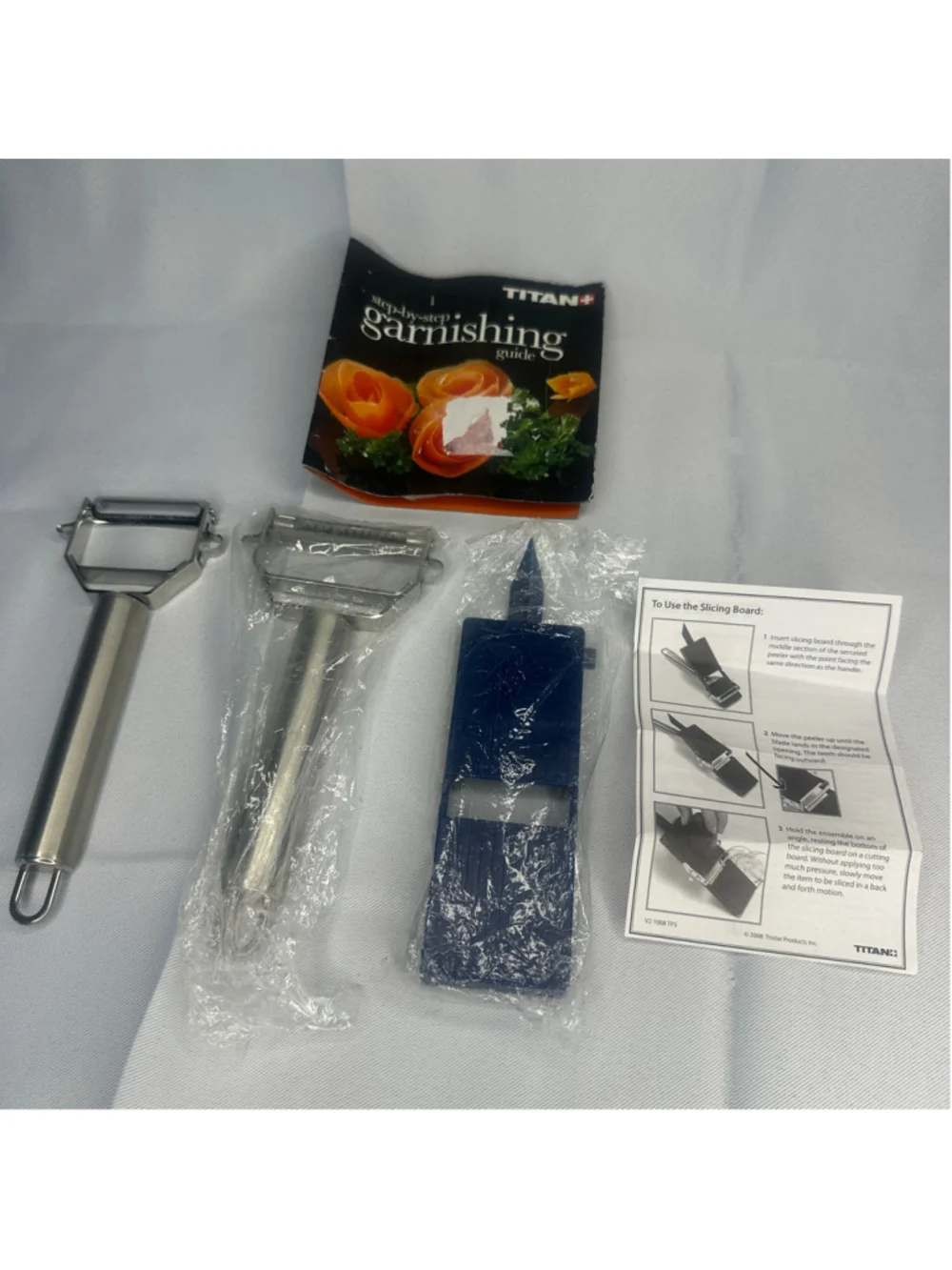 New Titan Stainless Steel Peeler Slicer As Seen On TV Blue Board Guide Book Set